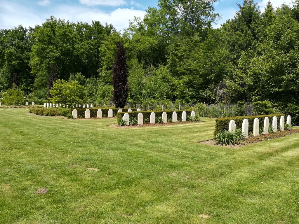 Rows of gravestones in the Second World War Cemetery at Orry-la-Ville.
